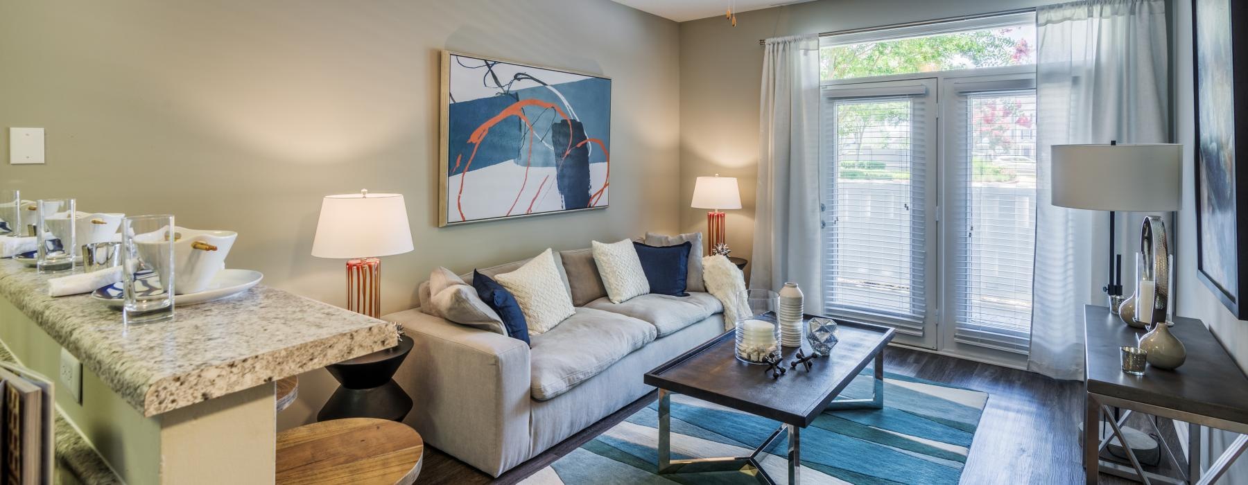 a living room with a couch and a table