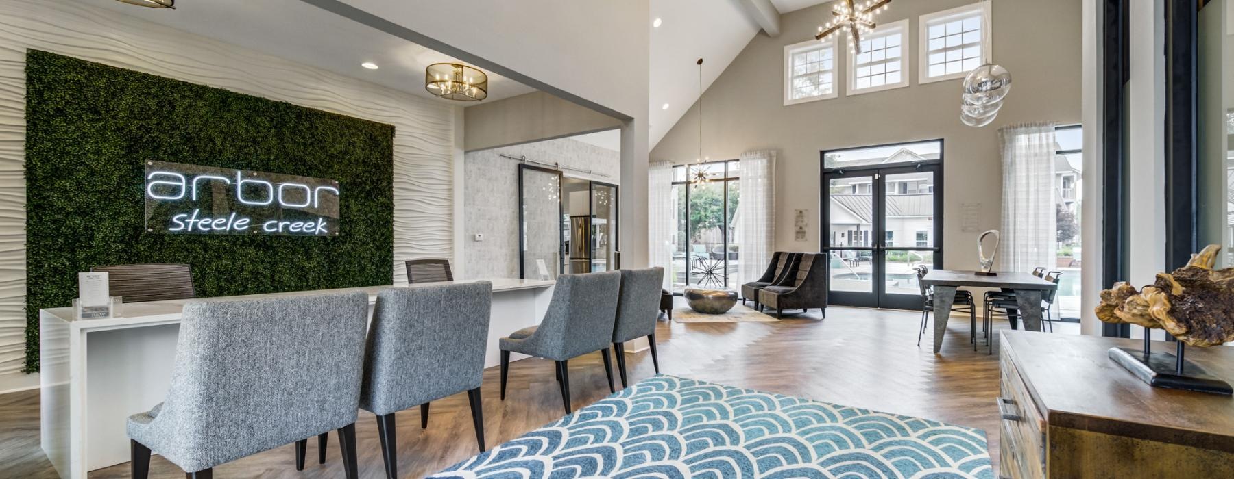 a large room with a table and chairs